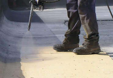 Coating systems over Prince Edward Island spray foam roof systems